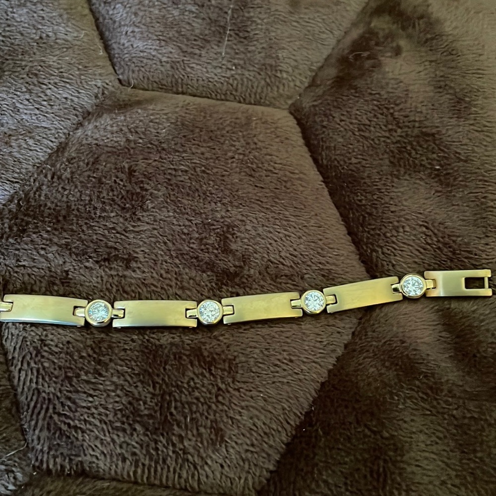 7” stainless steel bracelet done in goldtone